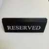 Reserved table sign, black textured faux leather, white print, small