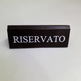   RISERVATO table sign, dark brown faux leather, white print, small