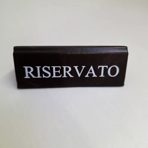 RISERVATO table sign, dark brown faux leather, white print, small