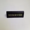 RISERVATO table sign, black faux leather, gold print, small