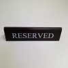 RESERVED table sign, dark brown faux leather, white print, large