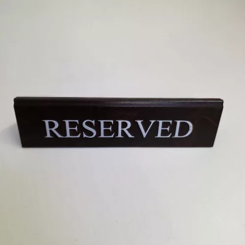 RESERVED table sign, dark brown faux leather, white print, large
