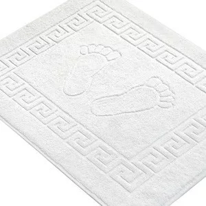 White terry bath mat for hotels