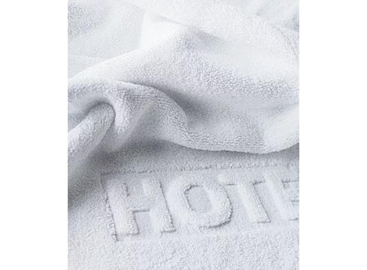 Hotel bath mats: how to choose size, weight and slip resistance